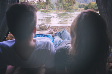 Image showing couple spending time together in straw tent