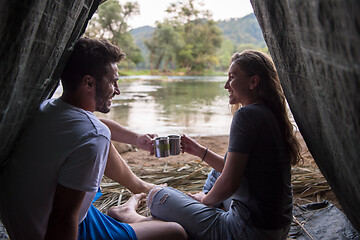 Image showing couple spending time together in straw tent