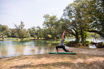 Image showing woman meditating and doing yoga exercise