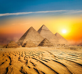 Image showing Pyramids in sand desert