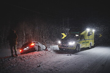 Image showing car accident on slippery winter road at night