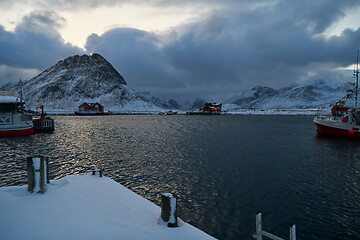 Image showing Traditional Norwegian fisherman\'s cabins and boats