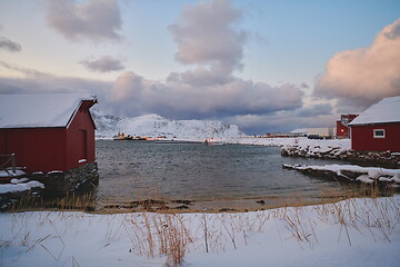 Image showing Traditional Norwegian fisherman\'s cabins and boats