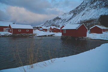 Image showing Traditional Norwegian fisherman\'s cabins and boats