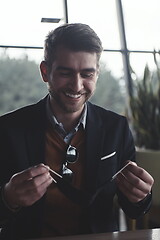 Image showing business man wearing protective face mask at luxury office