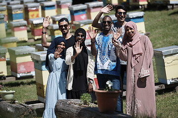 Image showing people group visiting local honey production farm