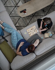 Image showing mother and daughter at home playing memory game