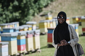 Image showing african muslim businesswoman portrait on small local honey production farm