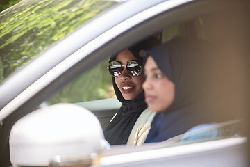 Image showing Arabic Woman Couple Traveling By Car