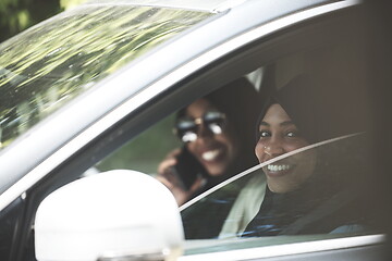 Image showing Arabic Woman Couple Traveling By Car