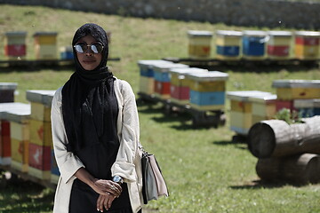 Image showing african muslim businesswoman portrait on small local honey production farm