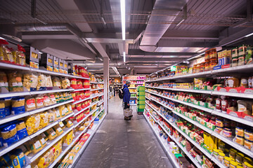 Image showing Man shopping in modern supermarket