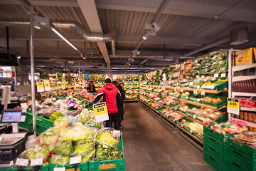 Image showing people shopping in modern supermarket