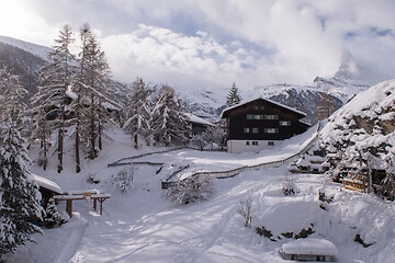 Image showing mountain houses at cold winter day