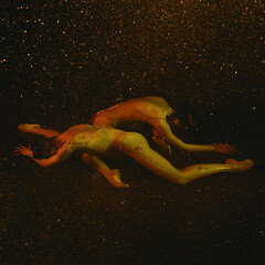 Image showing Two young female ballet dancers under water drops