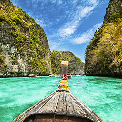 Image showing Traditional wooden boat in a picture perfect tropical bay on Koh Phi Phi Island, Thailand, Asia