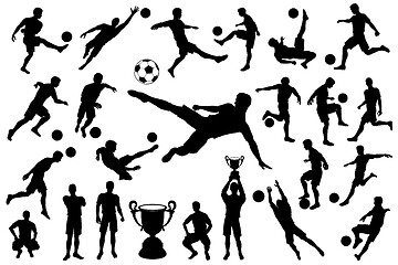 Image showing Silhouettes soccer player with ball and trophy cup