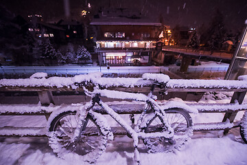 Image showing parked bicycle covered by snow