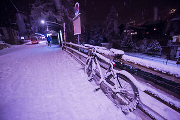 Image showing parked bicycle covered by snow