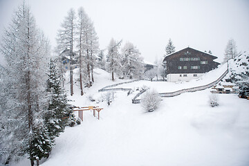 Image showing mountain house in snowstorm