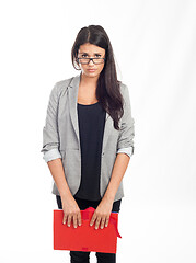 Image showing beautiful young businesswoman with a red folder