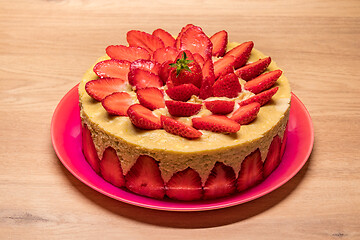 Image showing homemade strawberry cake in a red dish