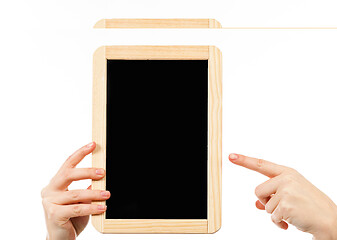 Image showing woman\'s hands holding a blackboard publicity