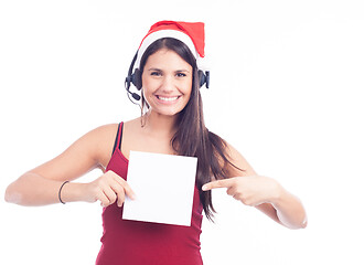 Image showing Christmas phone operator woman showing blank signboard