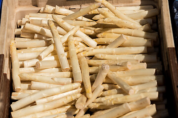 Image showing crate of fresh white asparagus on a market