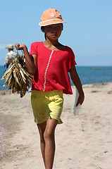 Image showing Girl with fish