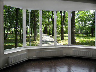 Image showing window with view of summer city park