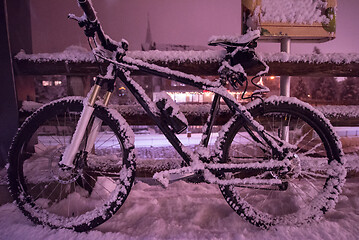 Image showing parked bicycle covered by snow