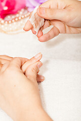Image showing Manicure of nails from a woman\'s hands before applying nail poli