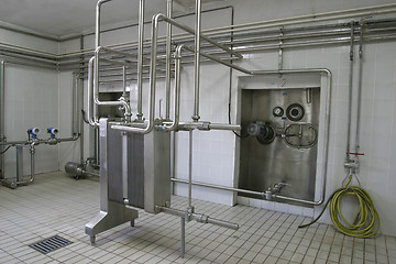 Image showing temperature controlled pressure tanks and valves in factory