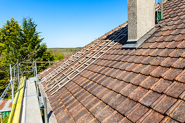 Image showing renovation of a brick tiled roof