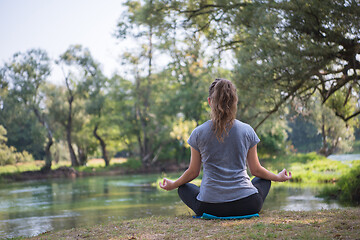 Image showing woman meditating and doing yoga exercise