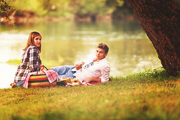 Image showing Couple in love enjoying picnic time