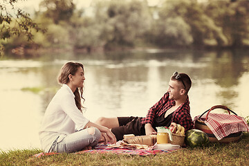 Image showing Couple in love enjoying picnic time