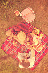 Image showing top view of couple enjoying picnic time