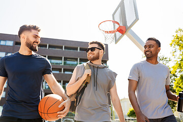 Image showing group of male friends going to play basketball