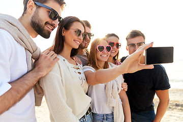 Image showing happy friends taking selfie in summer