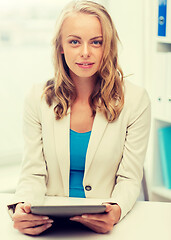 Image showing businesswoman or student with tablet pc at office