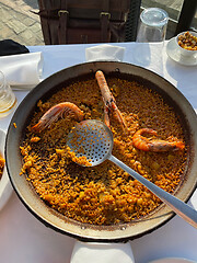 Image showing Amazing dinner with traditional Spanish paella in El Palmar