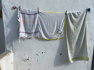 Image showing Drying towels in the village