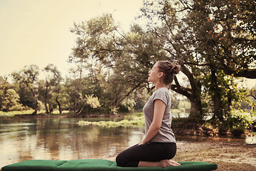 Image showing woman meditating and doing yoga exercise