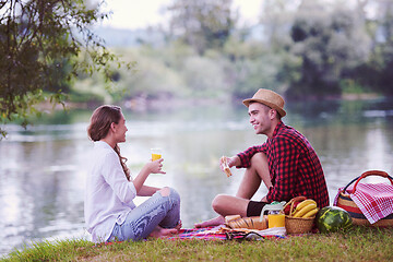 Image showing Couple in love enjoying picnic time