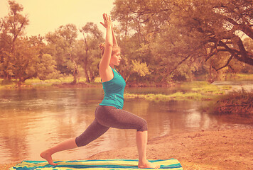 Image showing woman meditating and doing yoga exercise