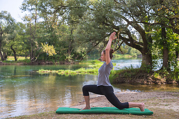 Image showing woman meditating and doing yoga exercise