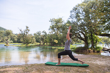 Image showing woman meditating and doing yoga exercise