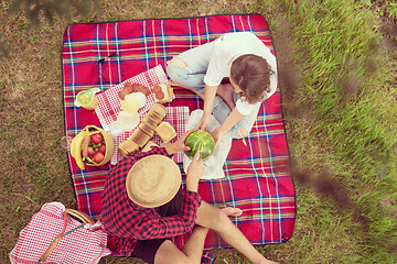 Image showing top view of couple enjoying picnic time